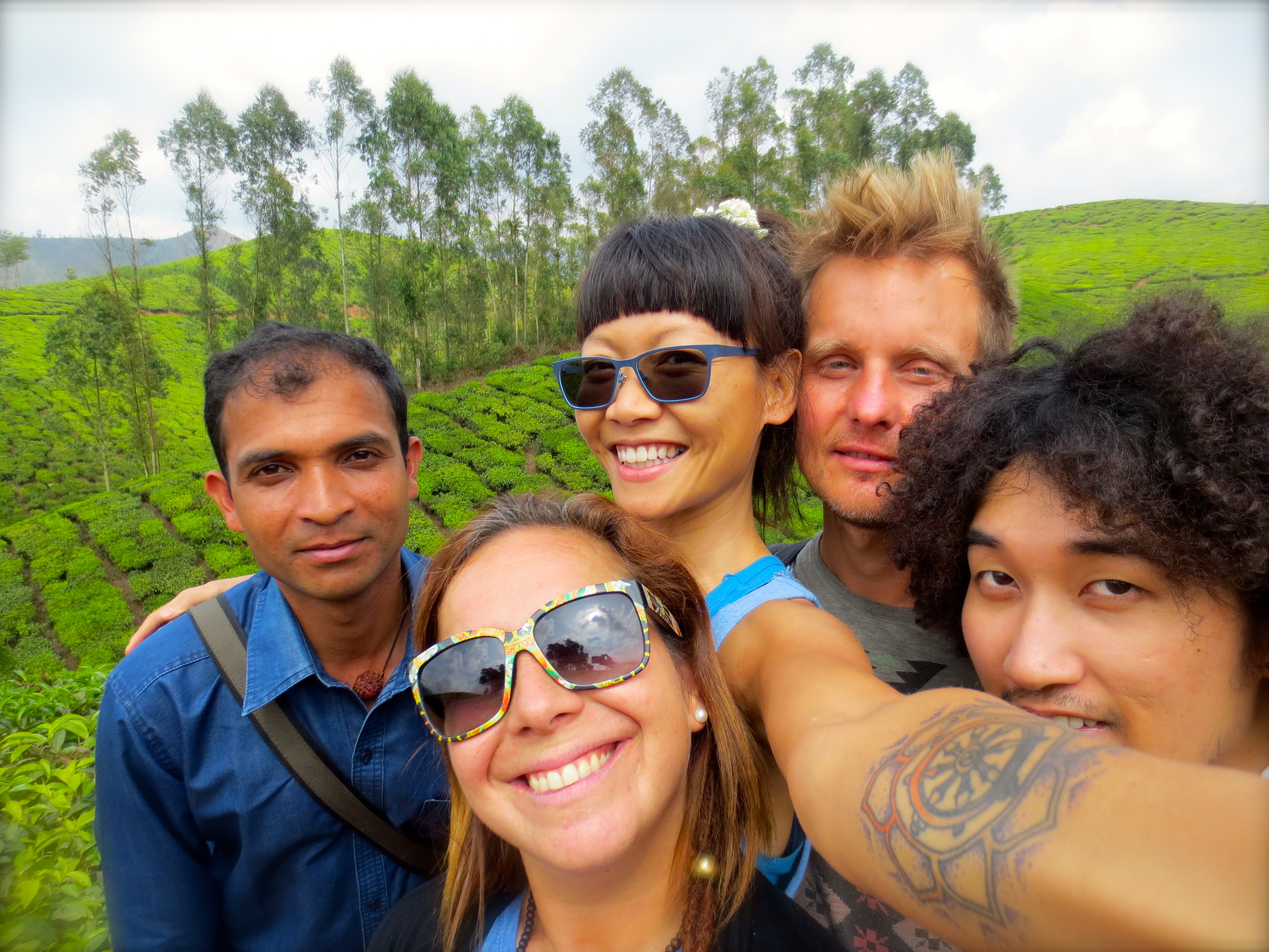 Budget travelers become fast friends, especially when we're trekking this big world alone. To experience the magic that day with new friends was a dream come true in many ways, and I believe each of us walked away with more love in our hearts that day. Munnar Hill Station, Kerala